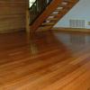 Brazillian cherry floor installed, sanded and finished in this log home