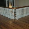 Refinished antique pine floors and hand scraped stair rail 